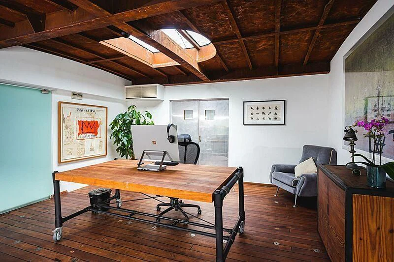 a room with a table and chairs aboard DOT Yacht for Sale