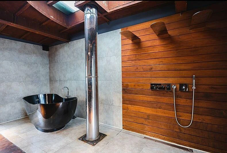 a metal pot on a tile floor aboard DOT Yacht for Sale
