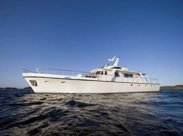 a white yacht on the water aboard STELLA NOVA Yacht for Sale