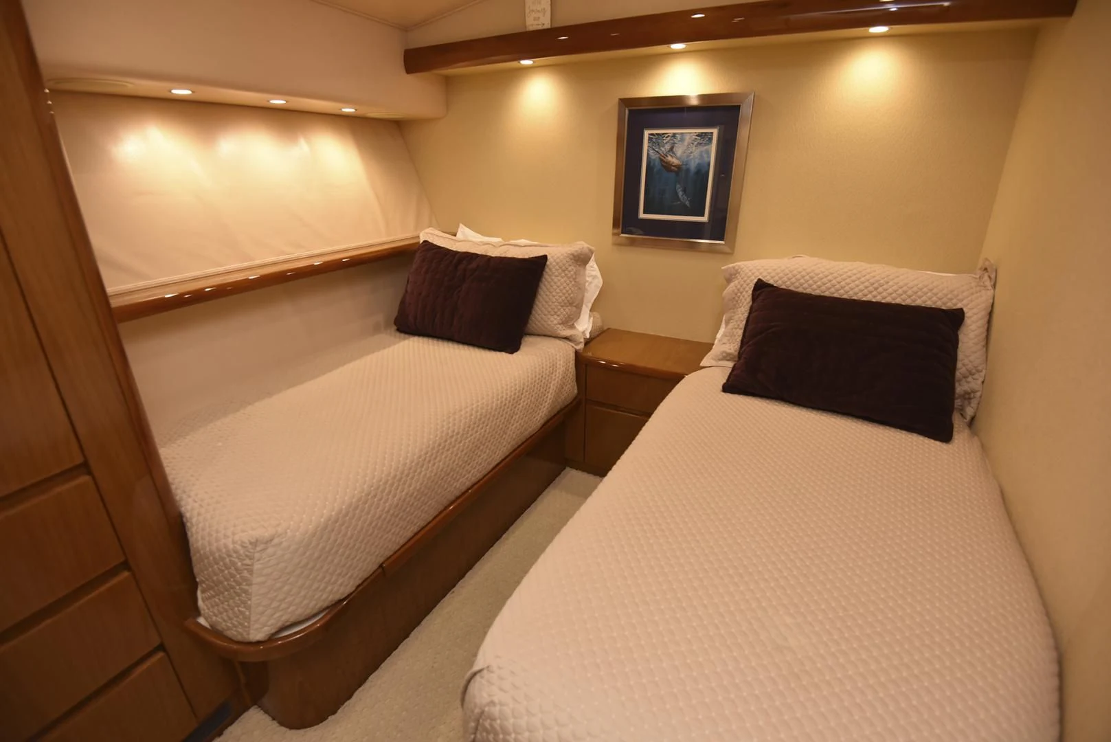 a couple of beds in a hotel room aboard SALTY K Yacht for Sale
