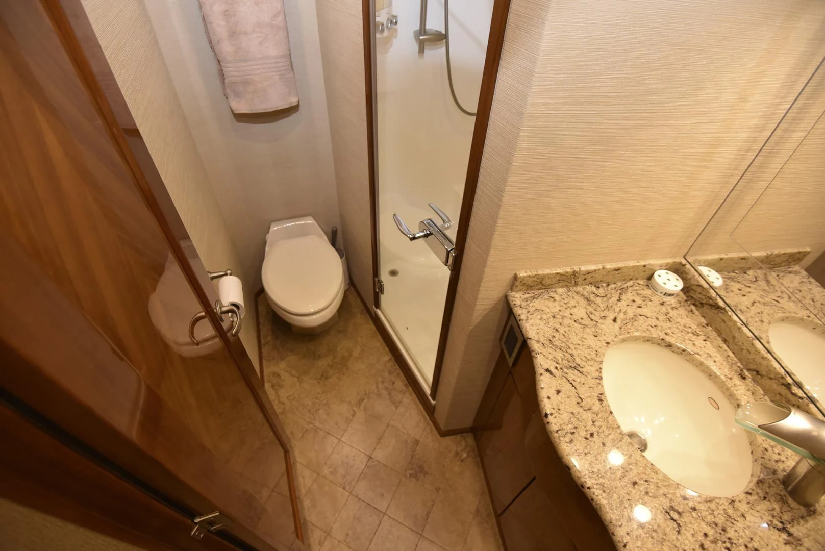 a bathroom with a sink toilet and a shower aboard SALTY K Yacht for Sale