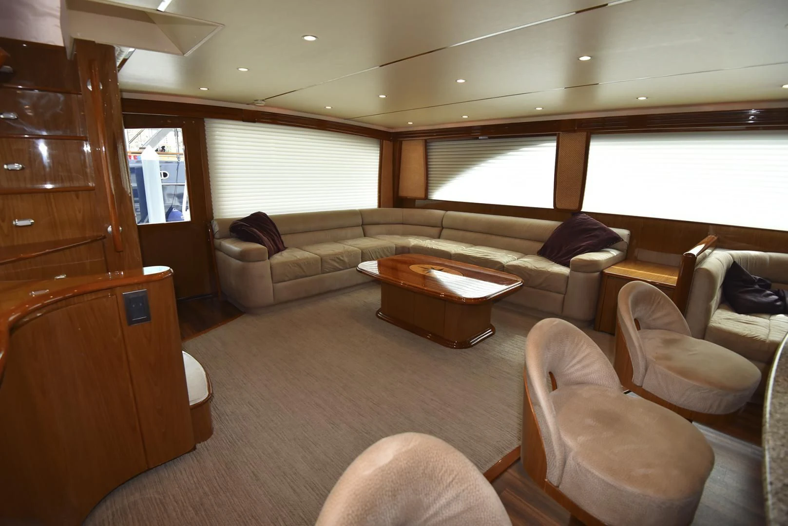 a living room with a couch and a coffee table aboard SALTY K Yacht for Sale