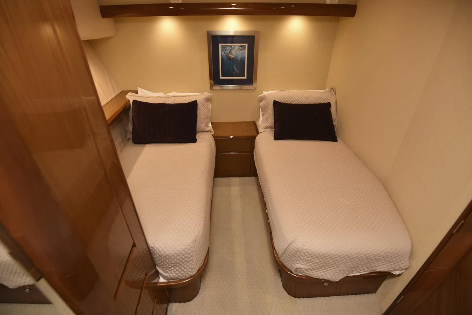 a couple of beds in a hotel room aboard SALTY K Yacht for Sale