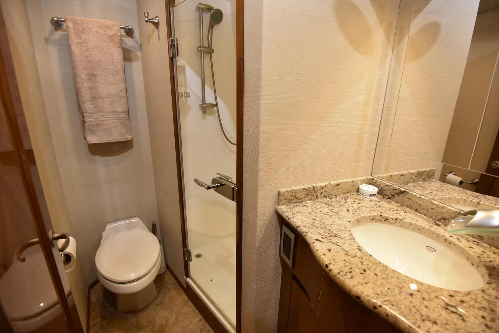 a bathroom with a sink and a toilet aboard SALTY K Yacht for Sale
