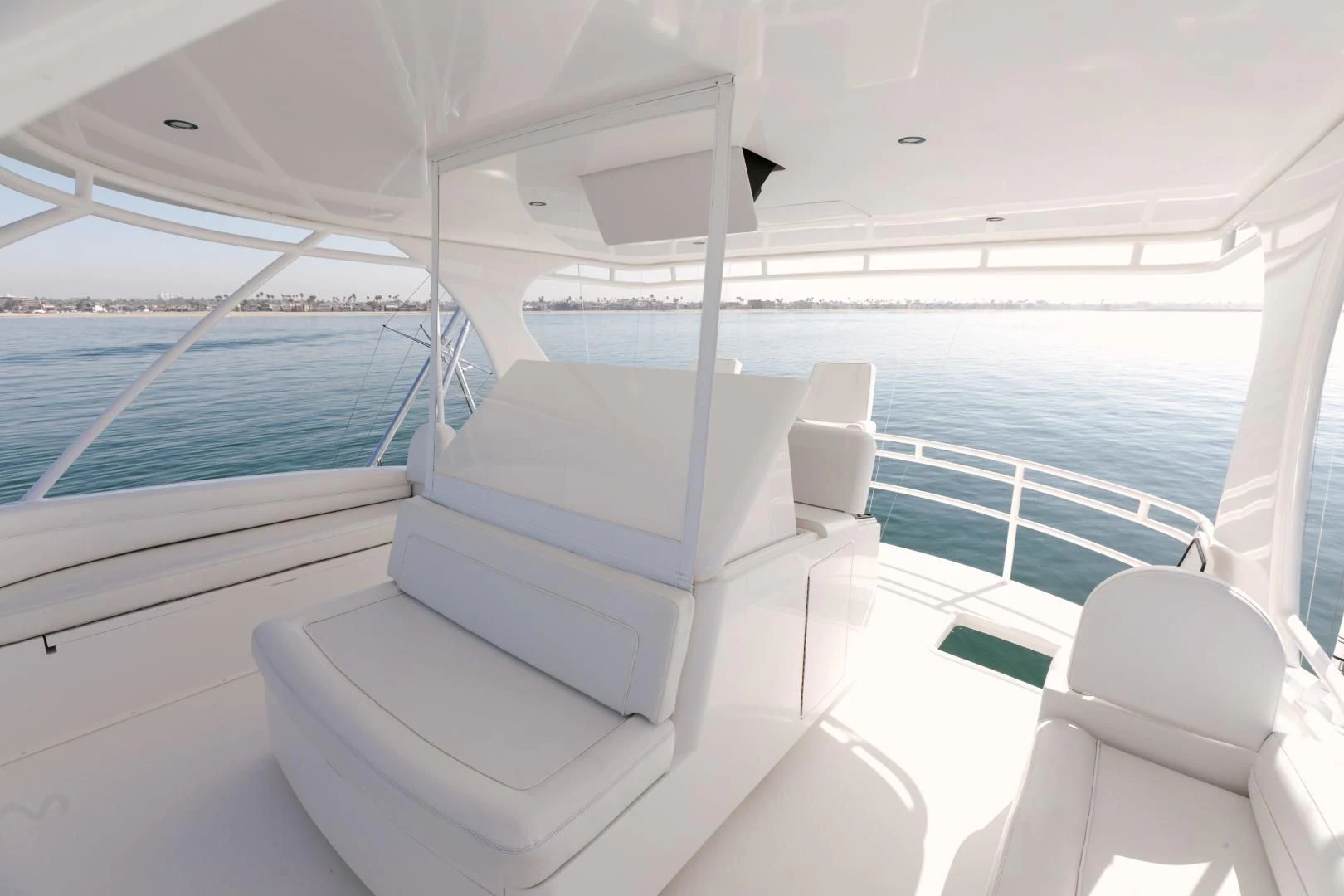 a white lounge chair on a boat aboard SALTY K Yacht for Sale