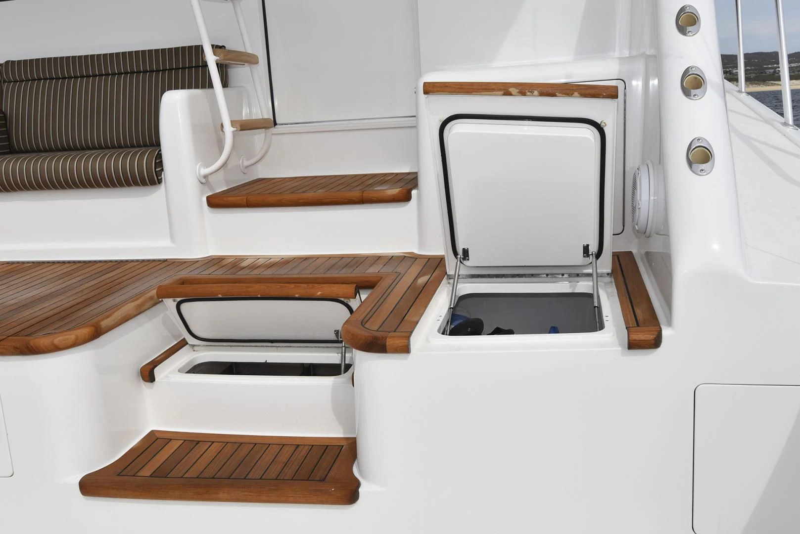 a white microwave on a white surface aboard SALTY K Yacht for Sale