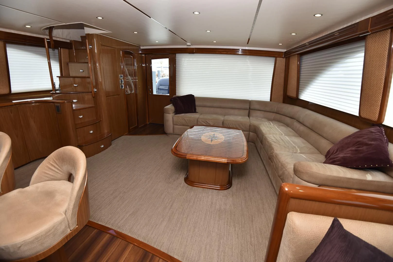 a living room with a couch and a table aboard SALTY K Yacht for Sale