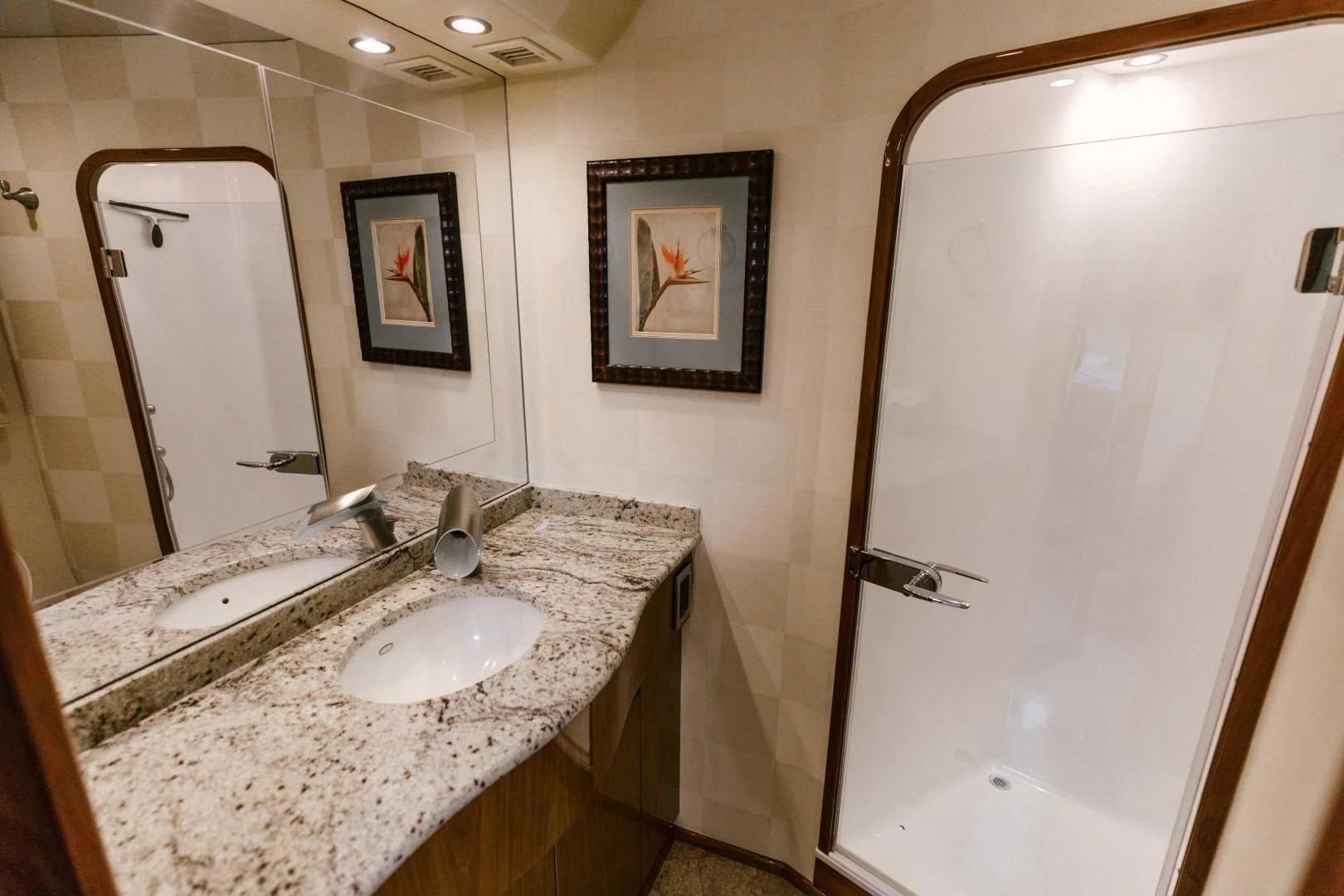 a bathroom with a marble countertop aboard SALTY K Yacht for Sale