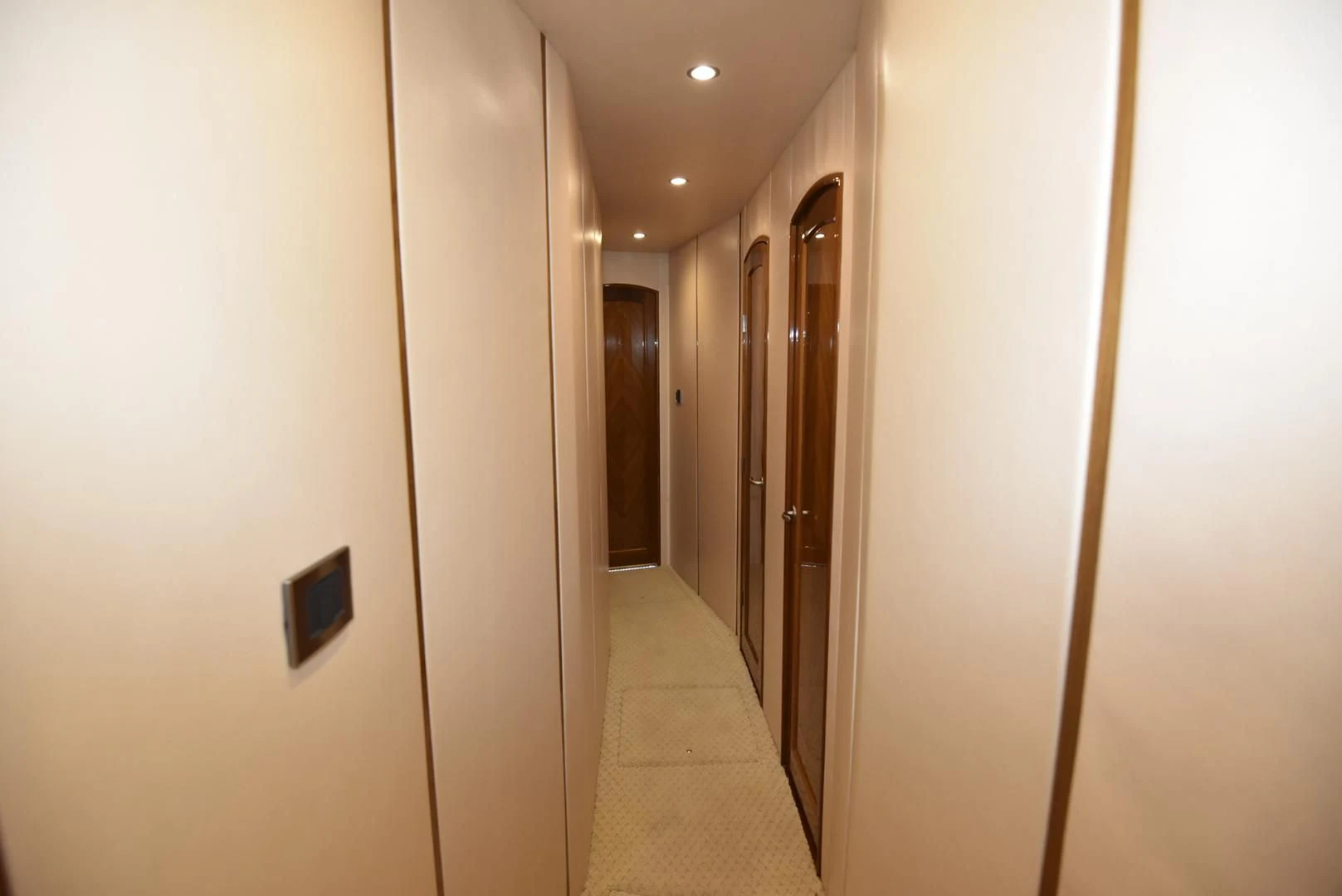 a hallway with doors aboard SALTY K Yacht for Sale