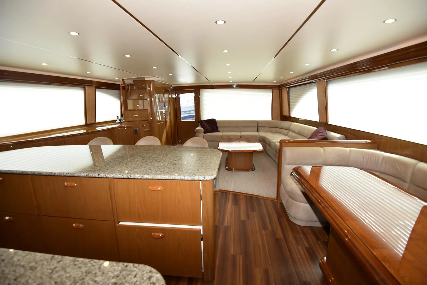 a room with a bed and a couch aboard SALTY K Yacht for Sale