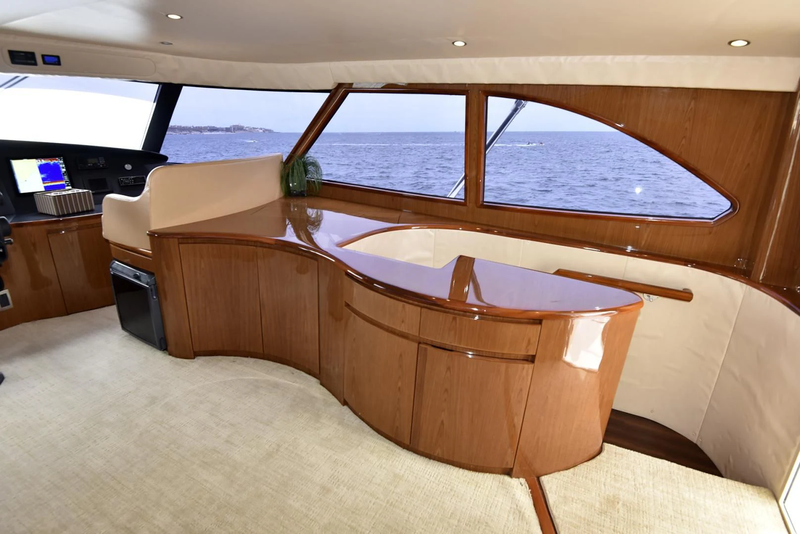 a room with a bed and a large window aboard SALTY K Yacht for Sale