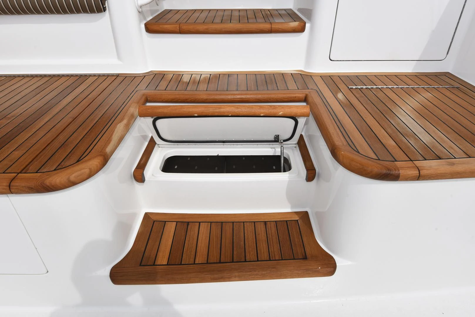 a white rectangular object with a wooden surface aboard SALTY K Yacht for Sale