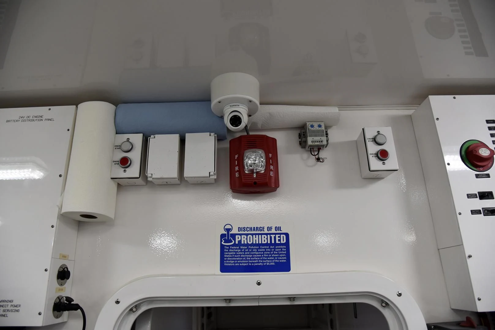 a white machine with buttons and a red button aboard SALTY K Yacht for Sale