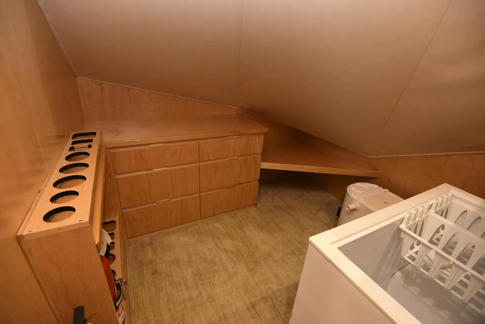 a room with a wood floor and a white piano aboard SALTY K Yacht for Sale