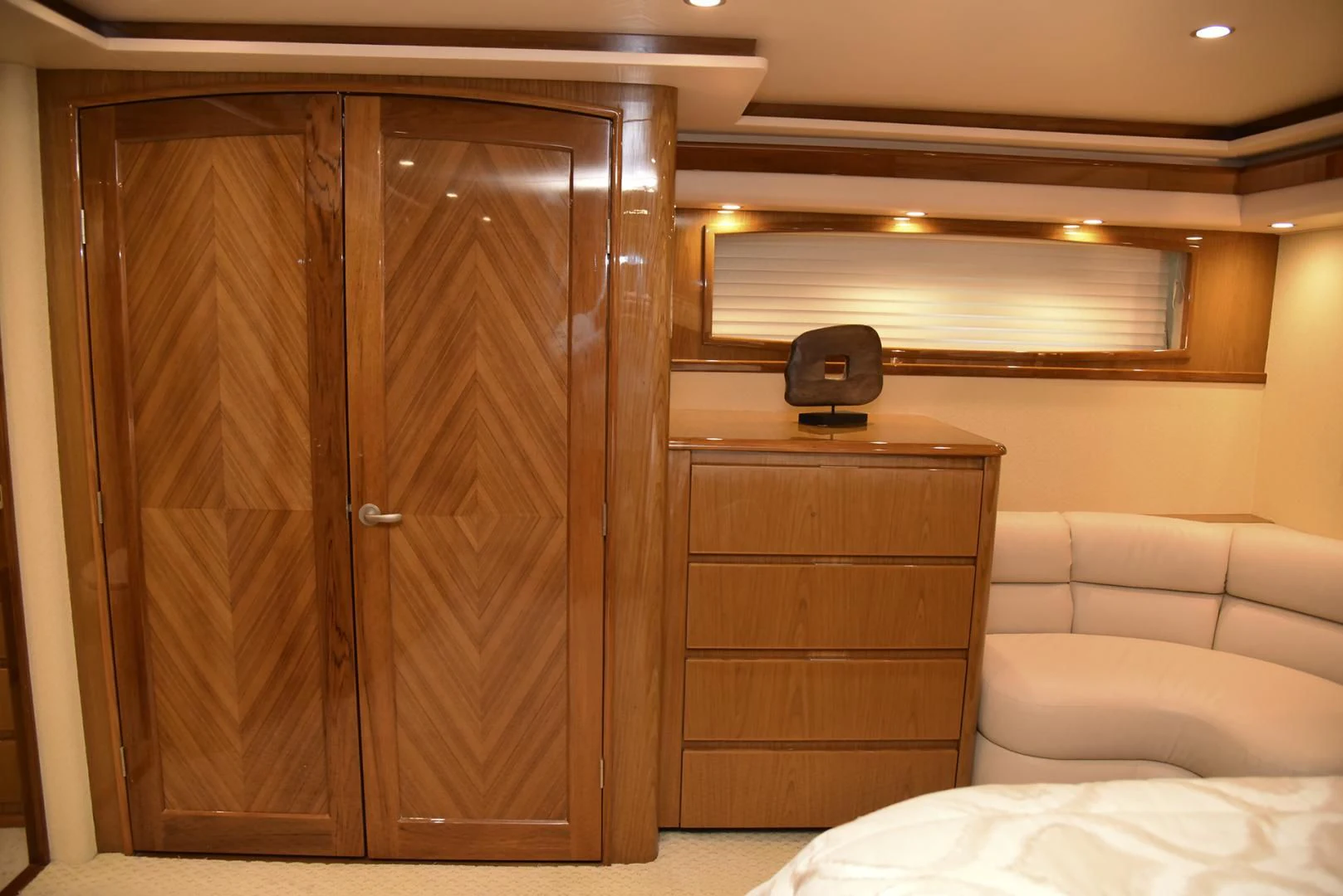 a room with a bed and a desk aboard SALTY K Yacht for Sale