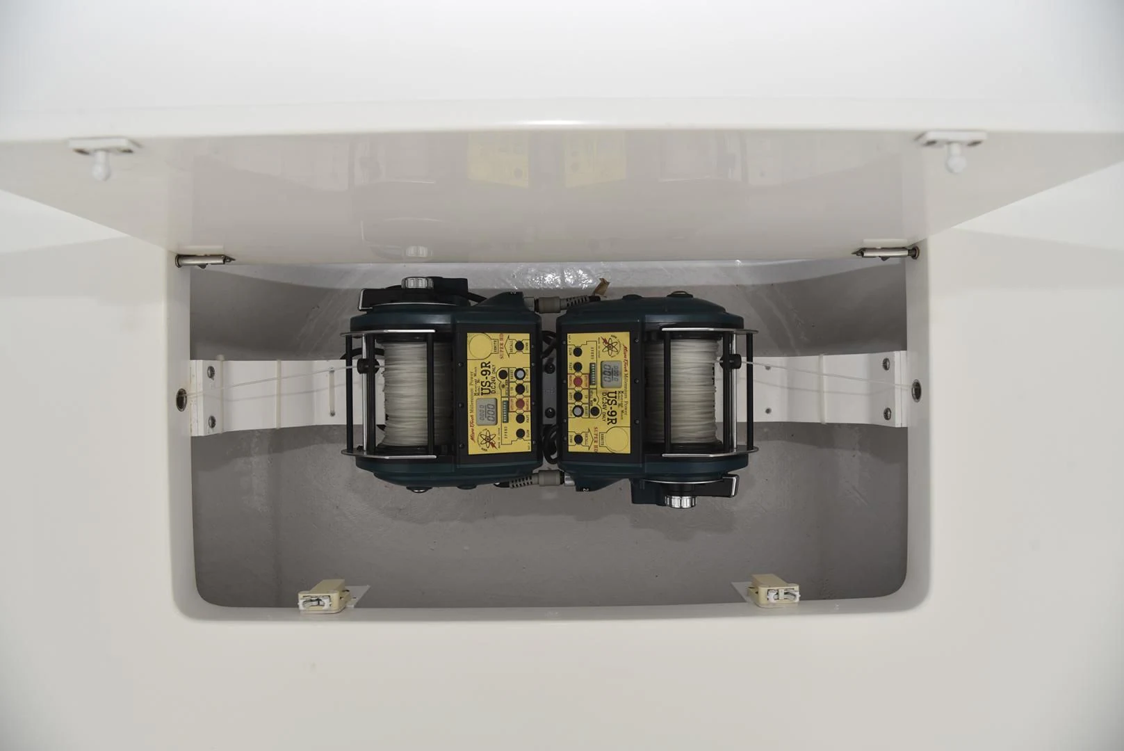 a black machine on a white surface aboard SALTY K Yacht for Sale