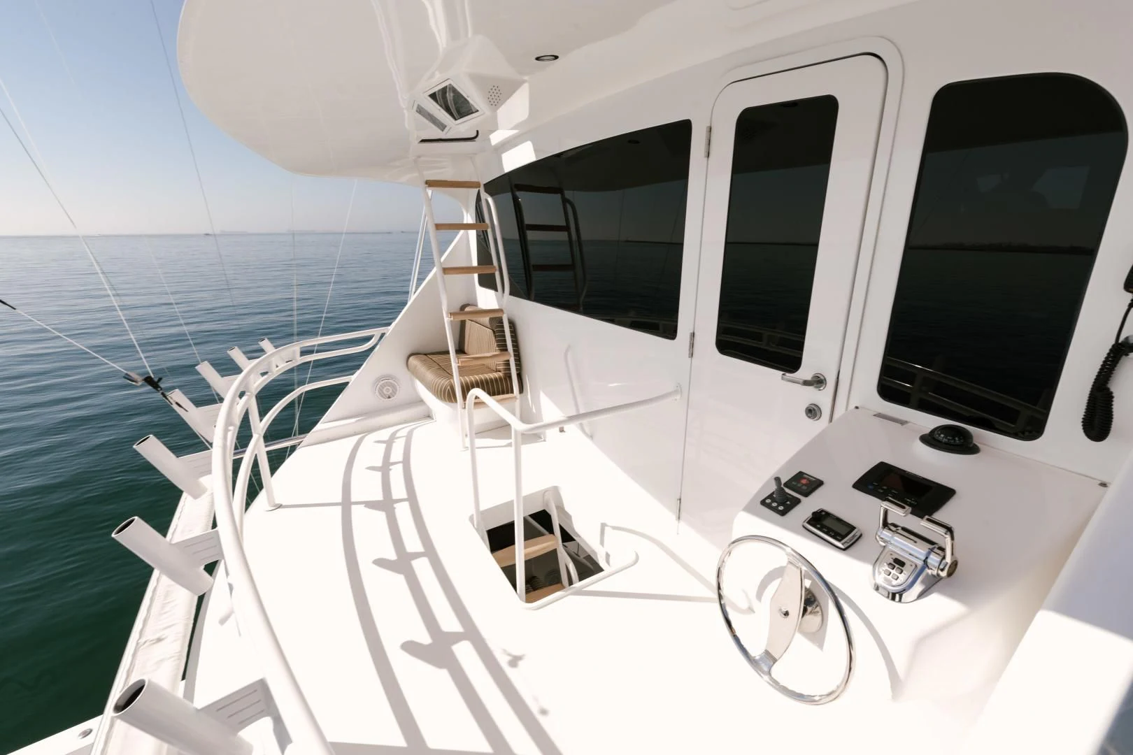 a white computer on a white surface aboard SALTY K Yacht for Sale