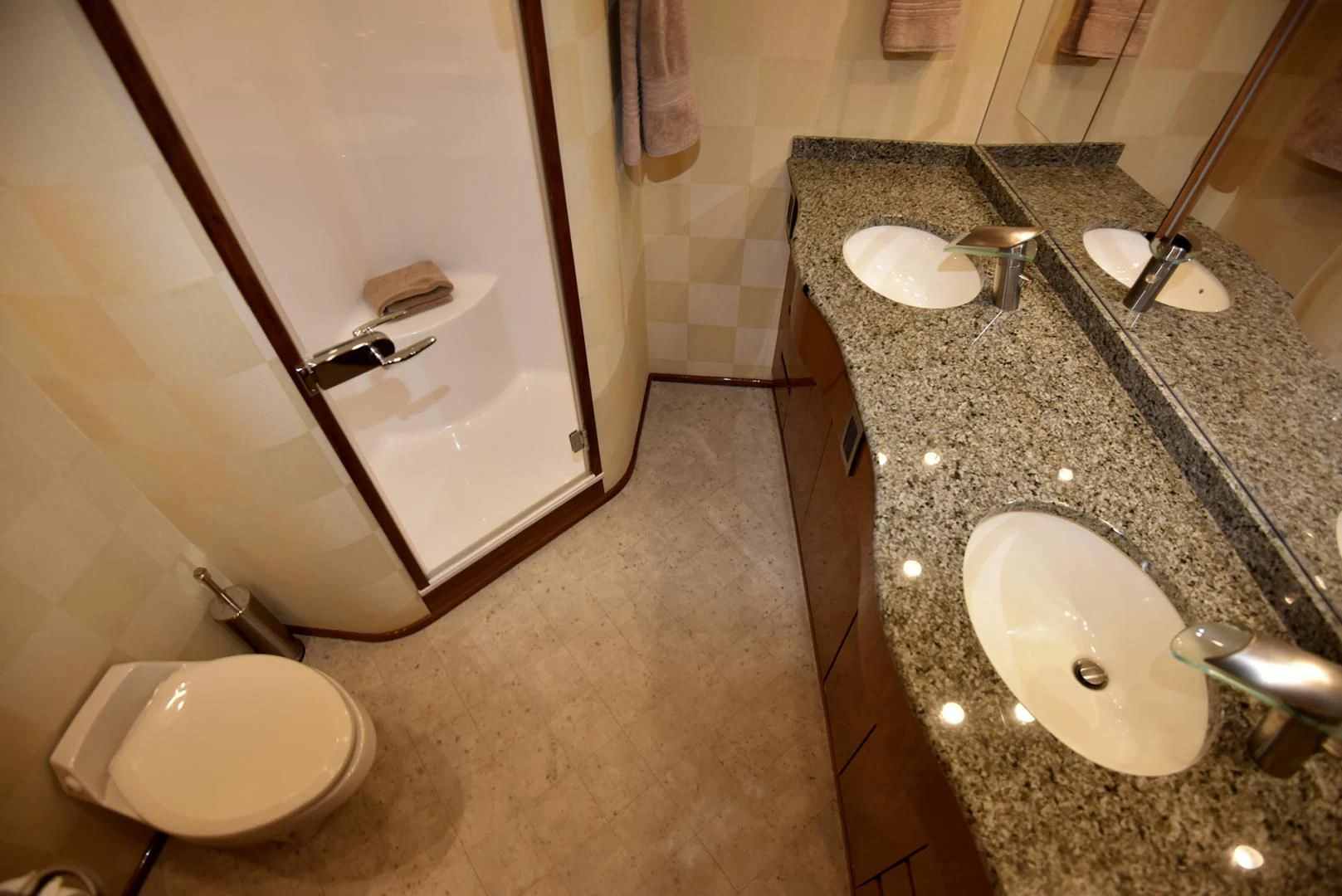 a bathroom with a sink and a toilet aboard SALTY K Yacht for Sale