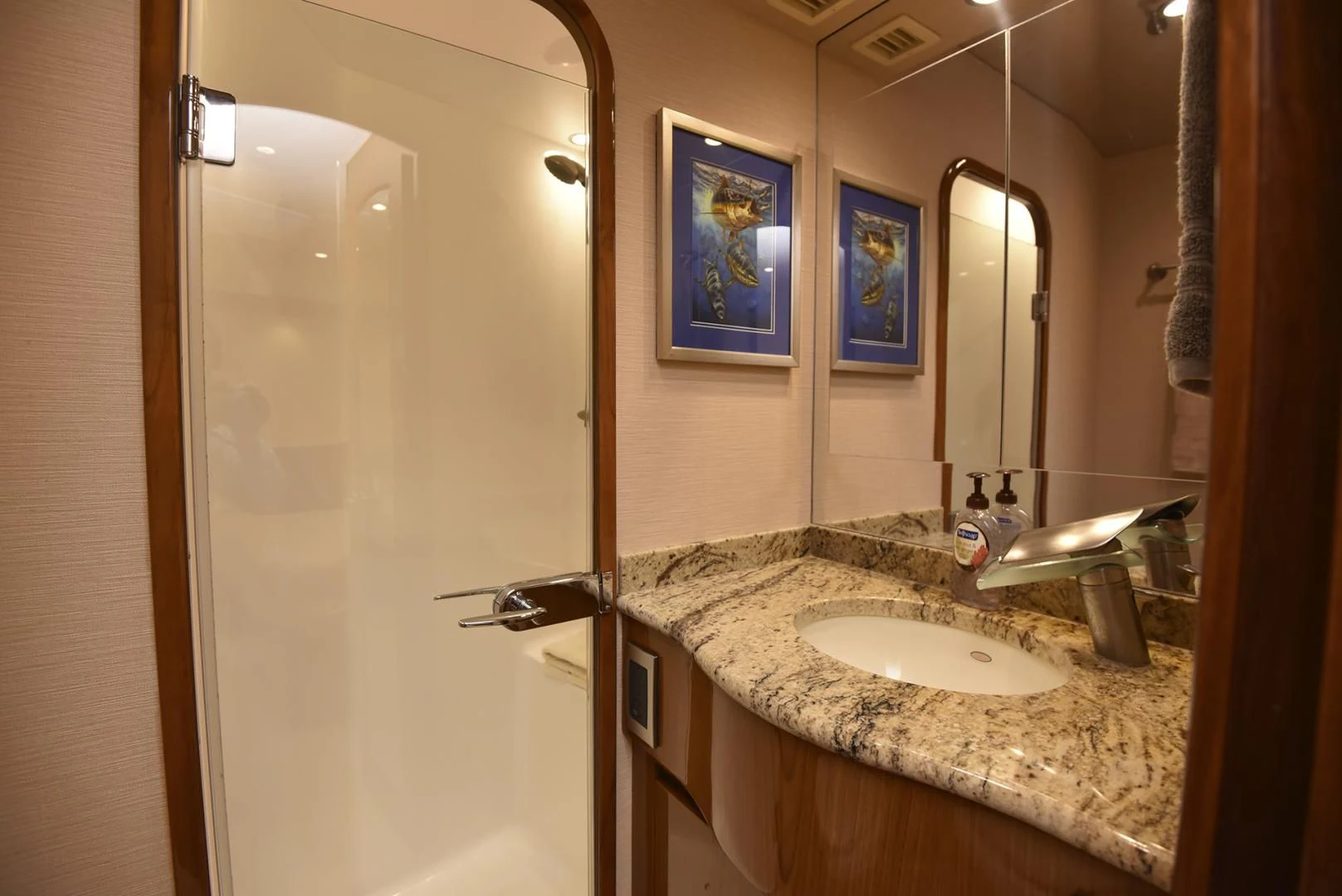 a bathroom with a marble counter top aboard SALTY K Yacht for Sale