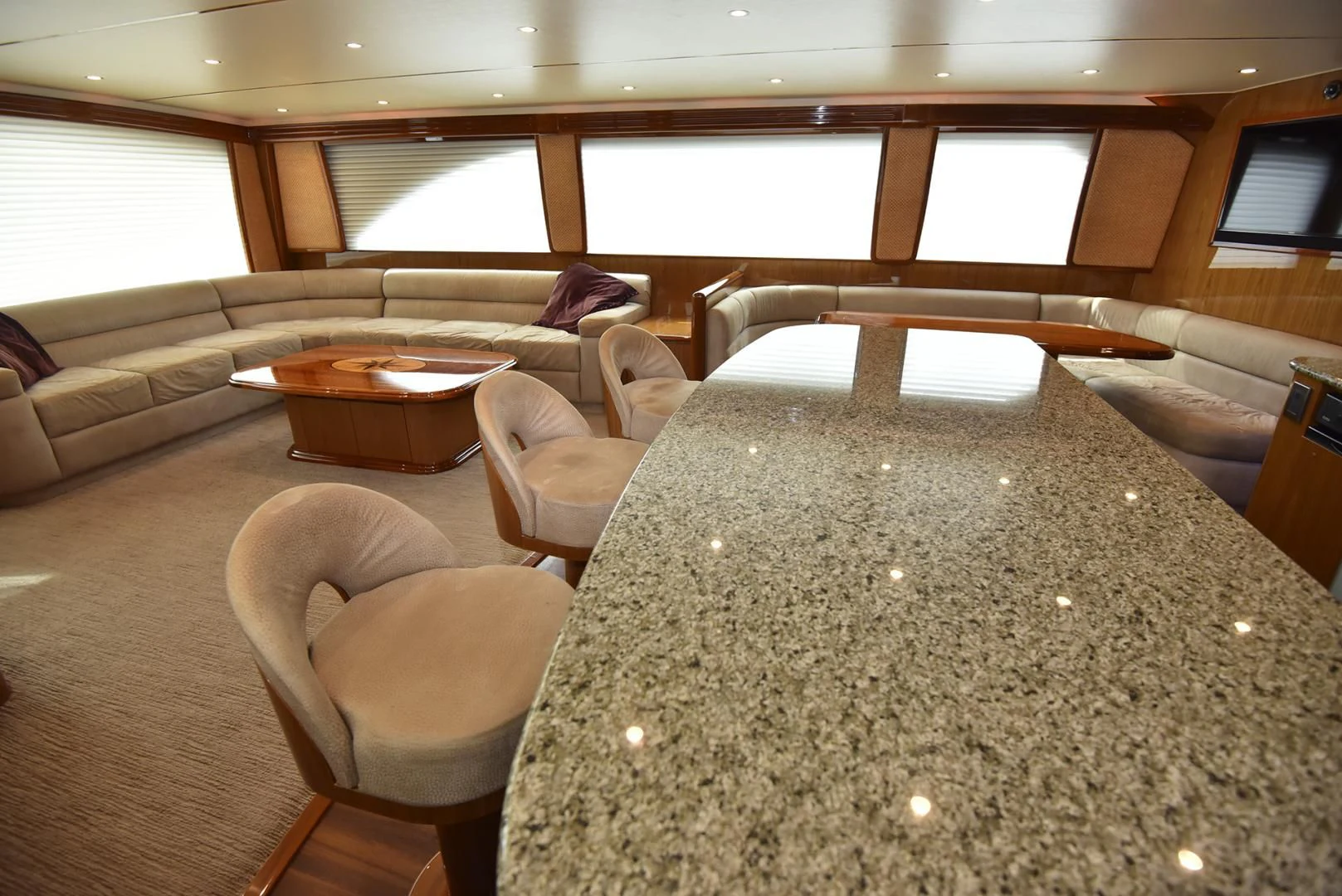 a living room with a couch and a table aboard SALTY K Yacht for Sale