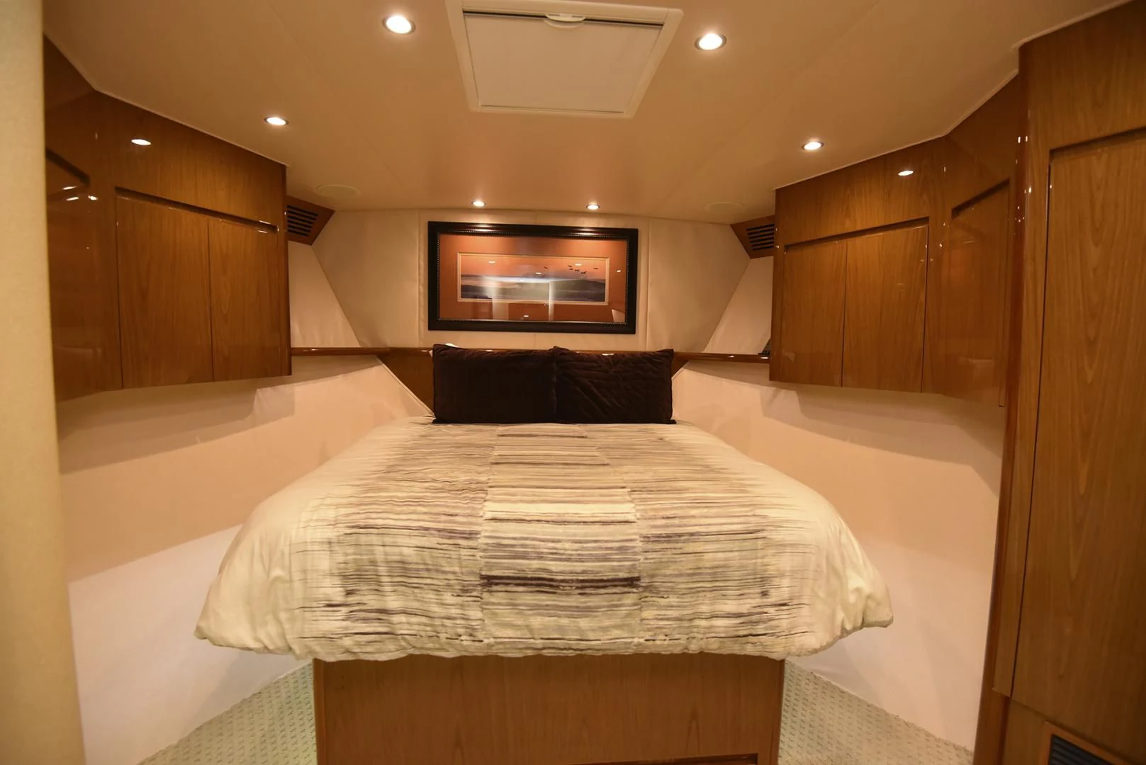 a bed in a room aboard SALTY K Yacht for Sale