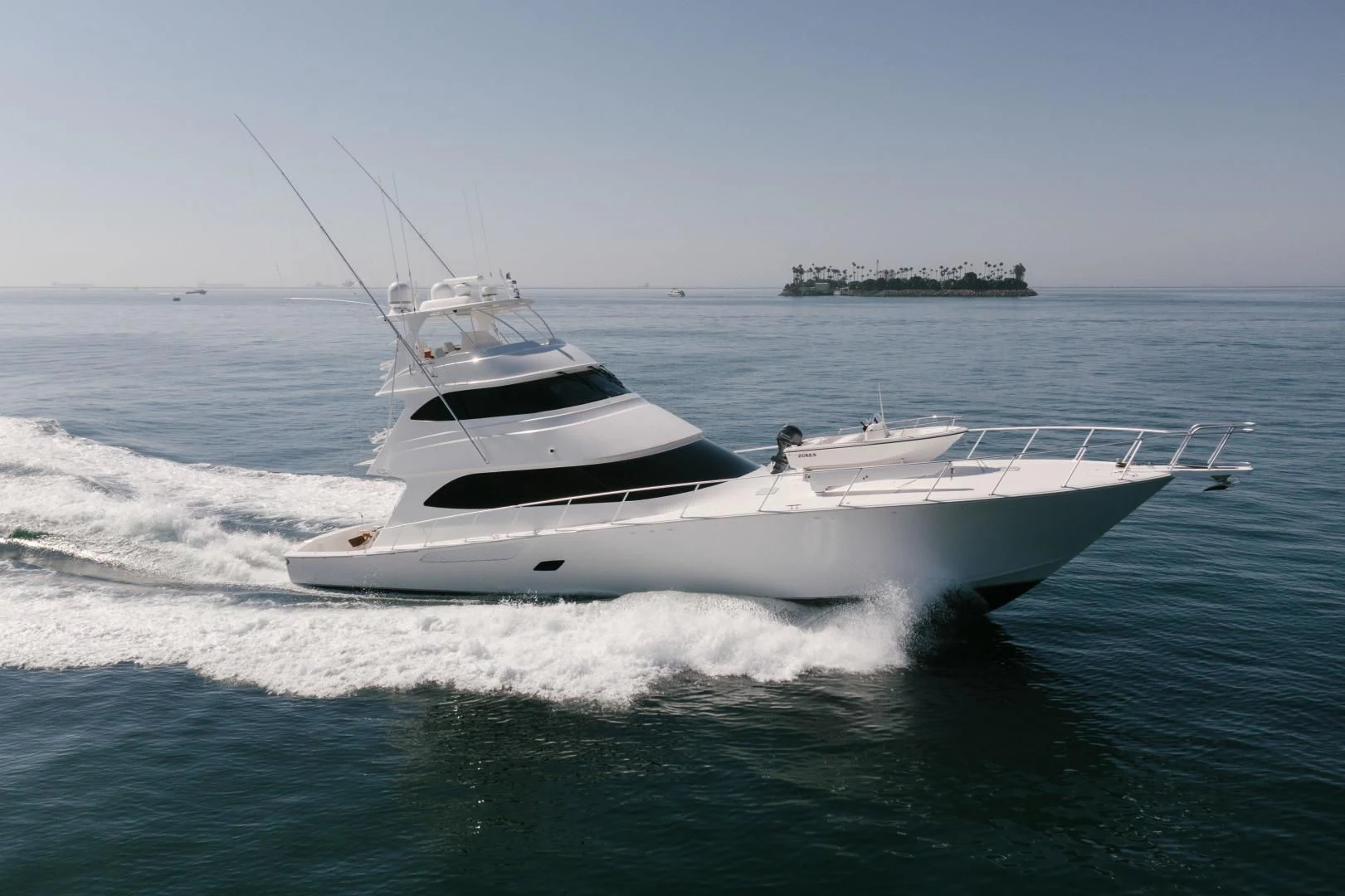 a white yacht on the water aboard SALTY K Yacht for Sale