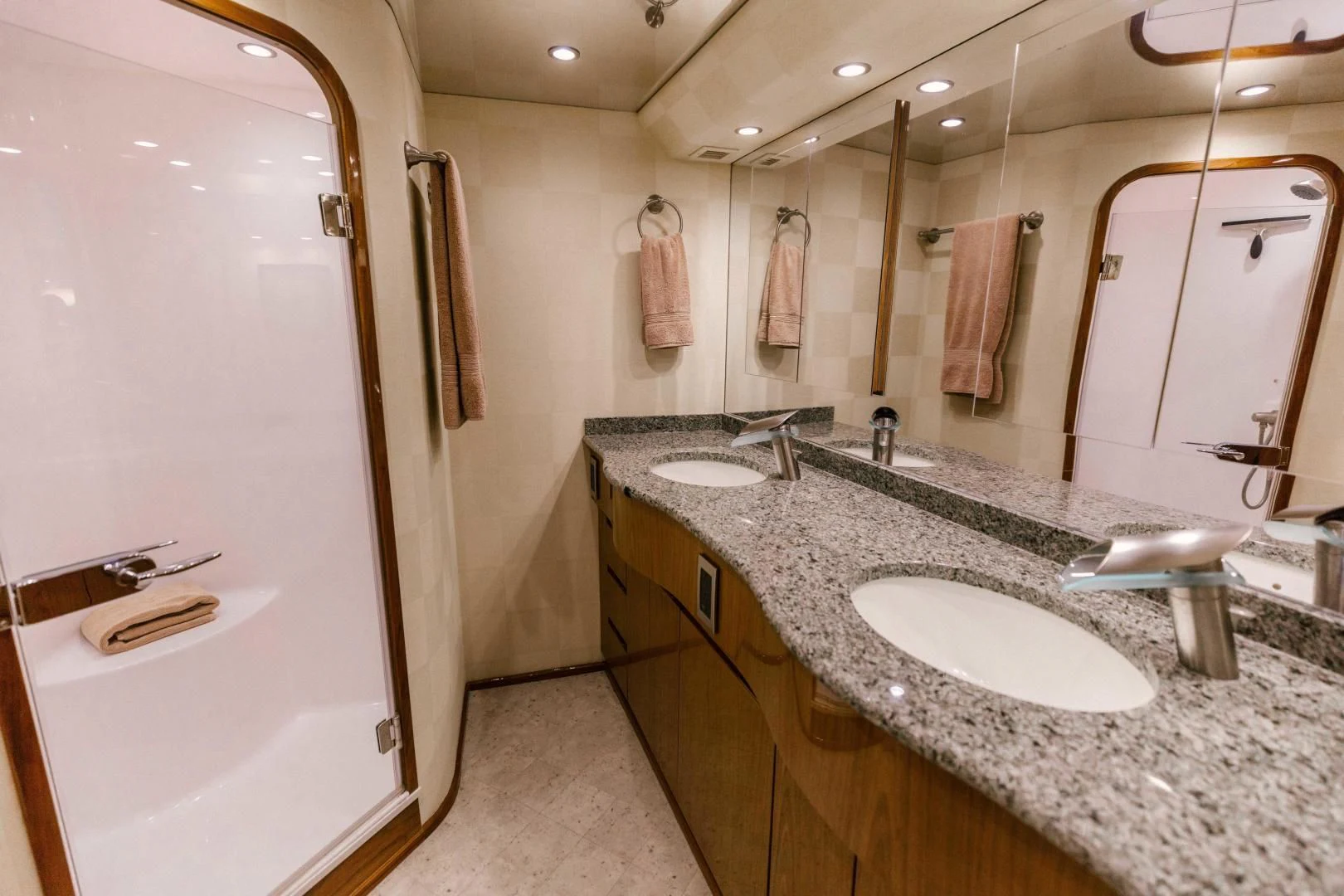 a bathroom with a marble countertop aboard SALTY K Yacht for Sale