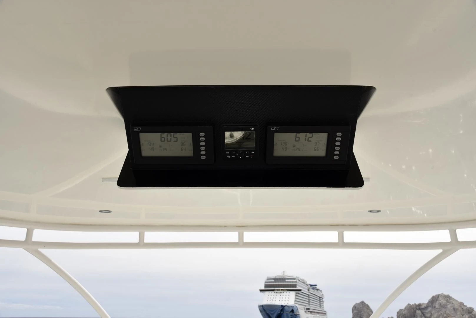 a black rectangular object with a white surface and a white wall and a black rectangular object with a aboard SALTY K Yacht for Sale
