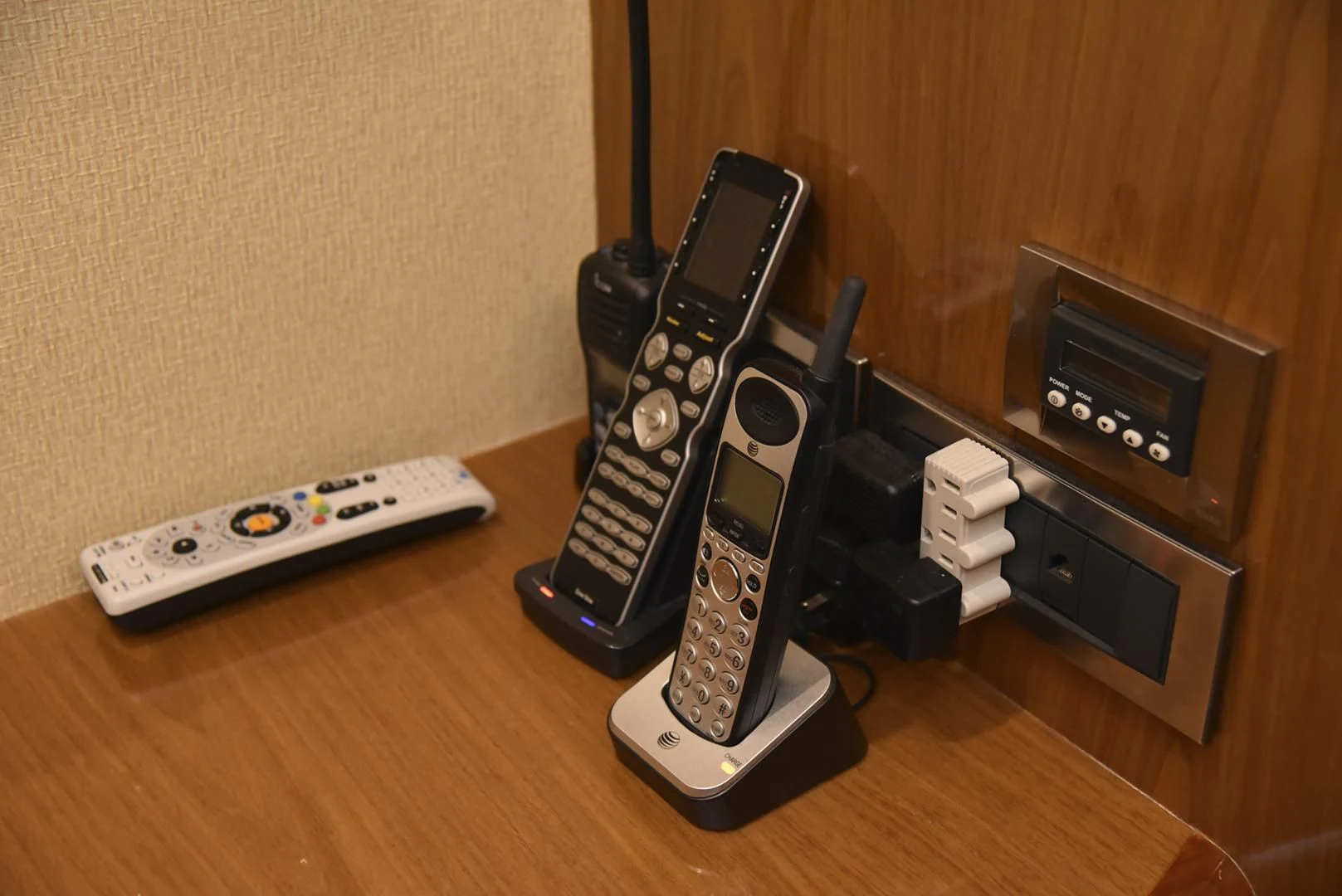 a group of remote controls aboard SALTY K Yacht for Sale