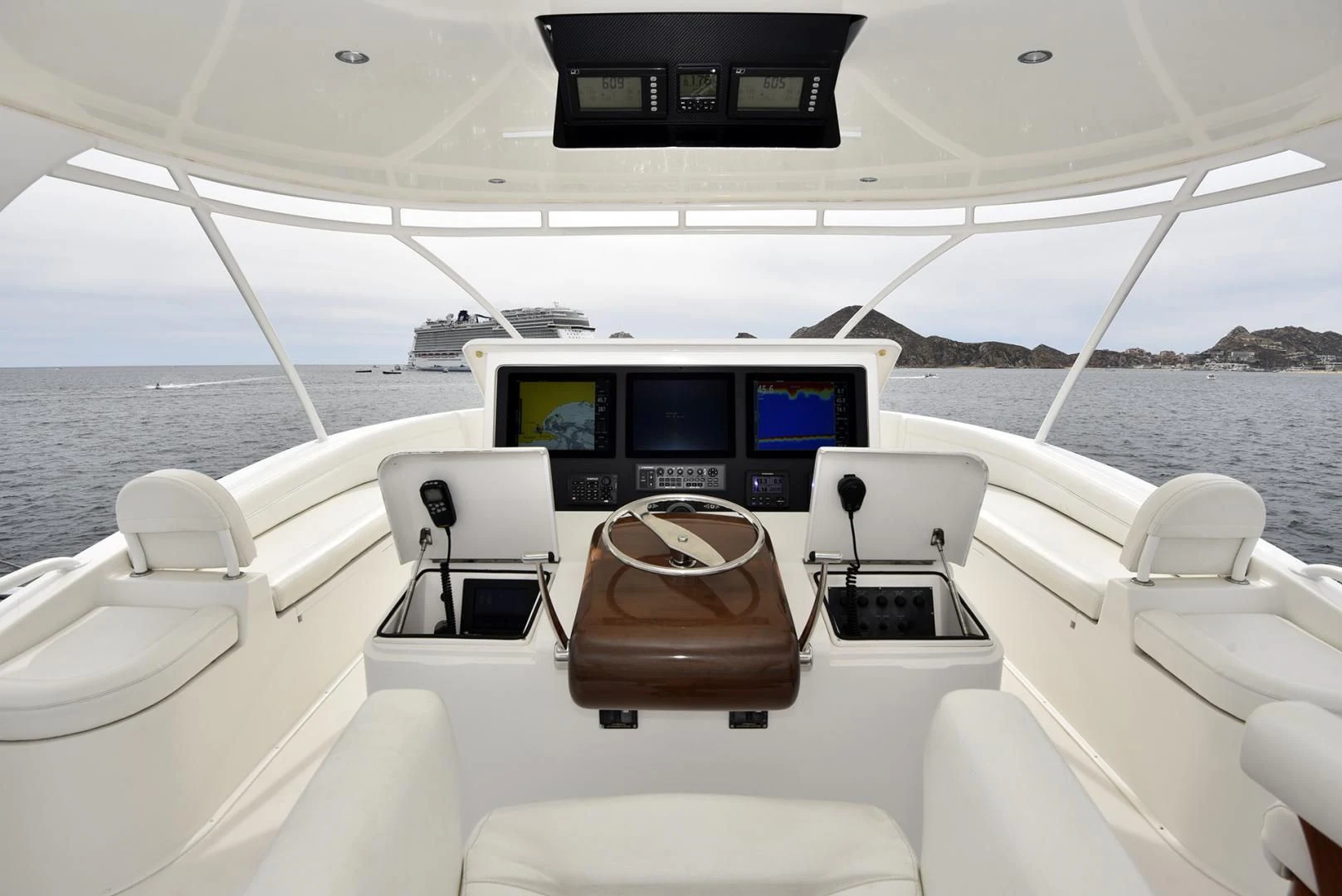 a boat with a screen on the back aboard SALTY K Yacht for Sale