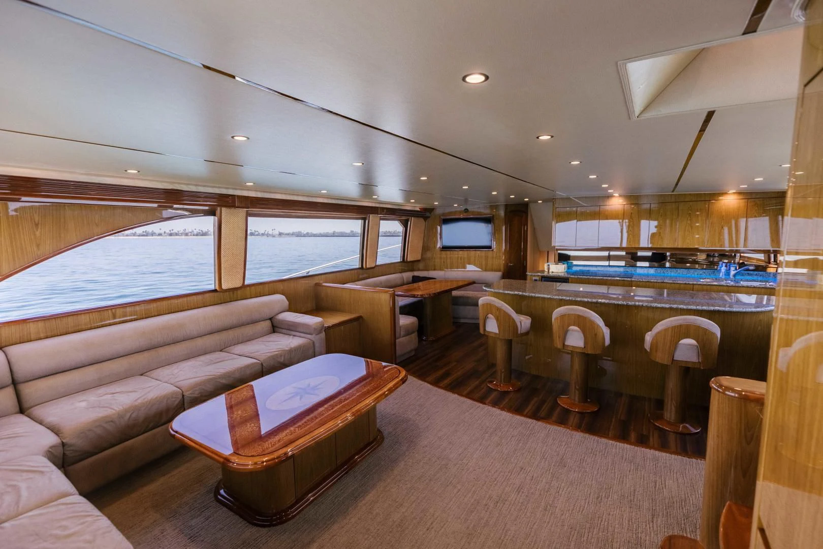a large living room with a pool aboard SALTY K Yacht for Sale