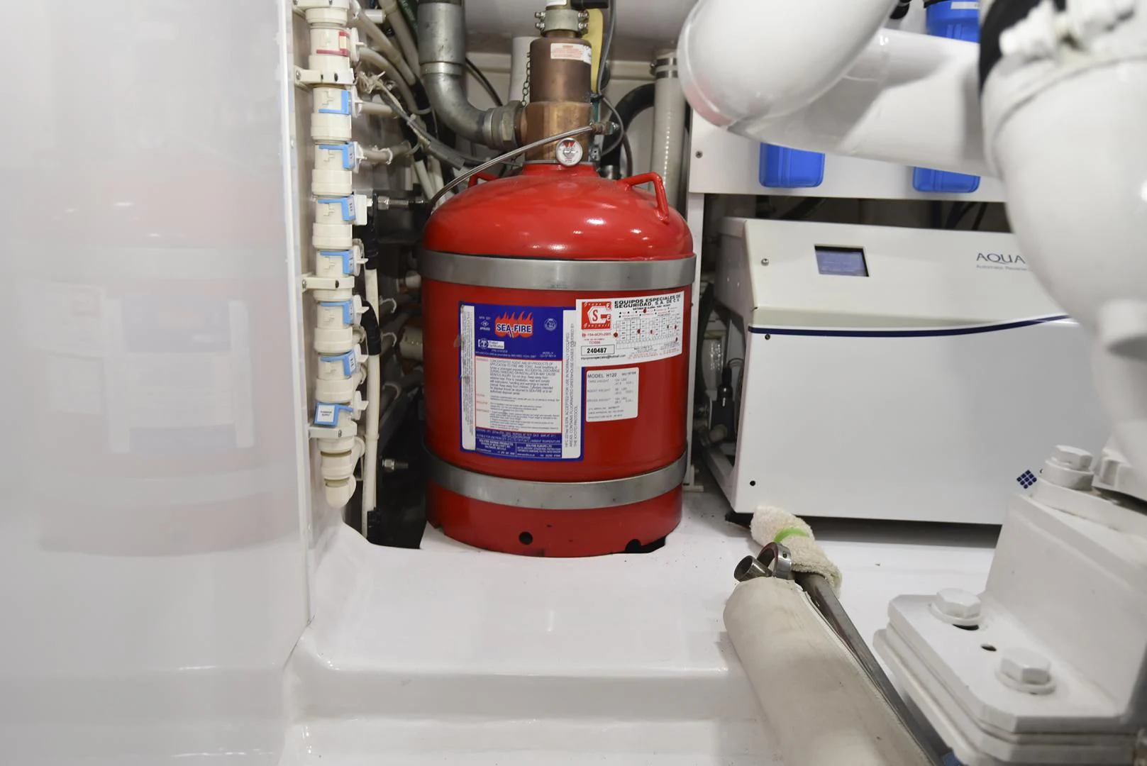 a red and white machine aboard SALTY K Yacht for Sale