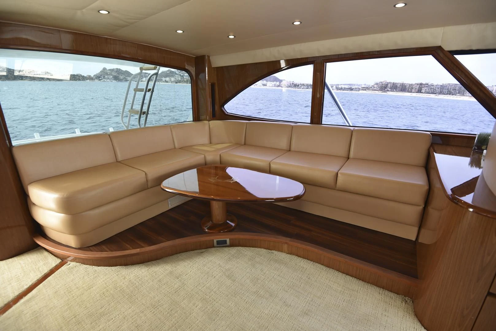 a room with couches and a table aboard SALTY K Yacht for Sale