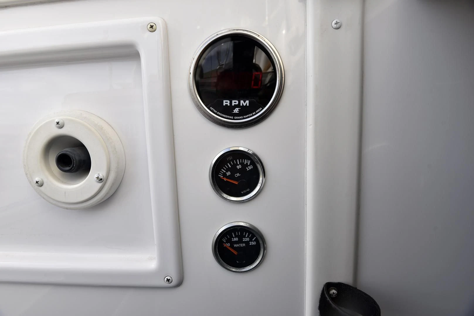 a close-up of a white car's dashboard aboard SALTY K Yacht for Sale