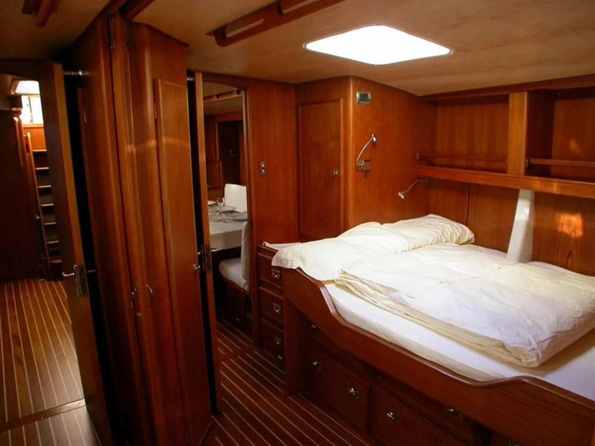 a bed in a cabin aboard MATCHLESS Yacht for Sale