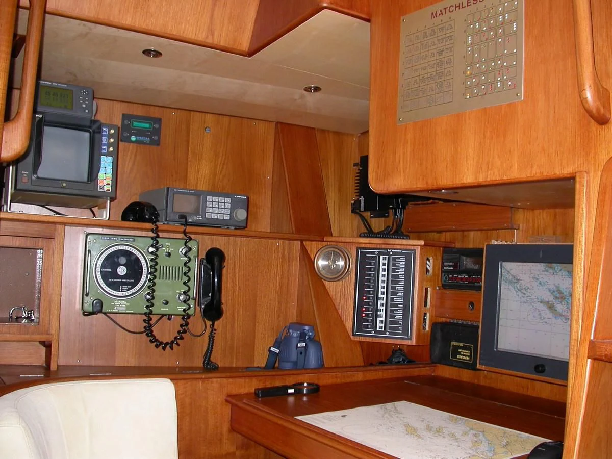 a computer on a desk aboard MATCHLESS Yacht for Sale