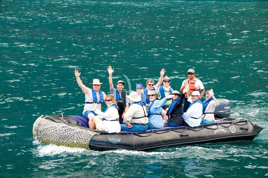 a group of people on a boat aboard INTEGRITY Yacht for Sale