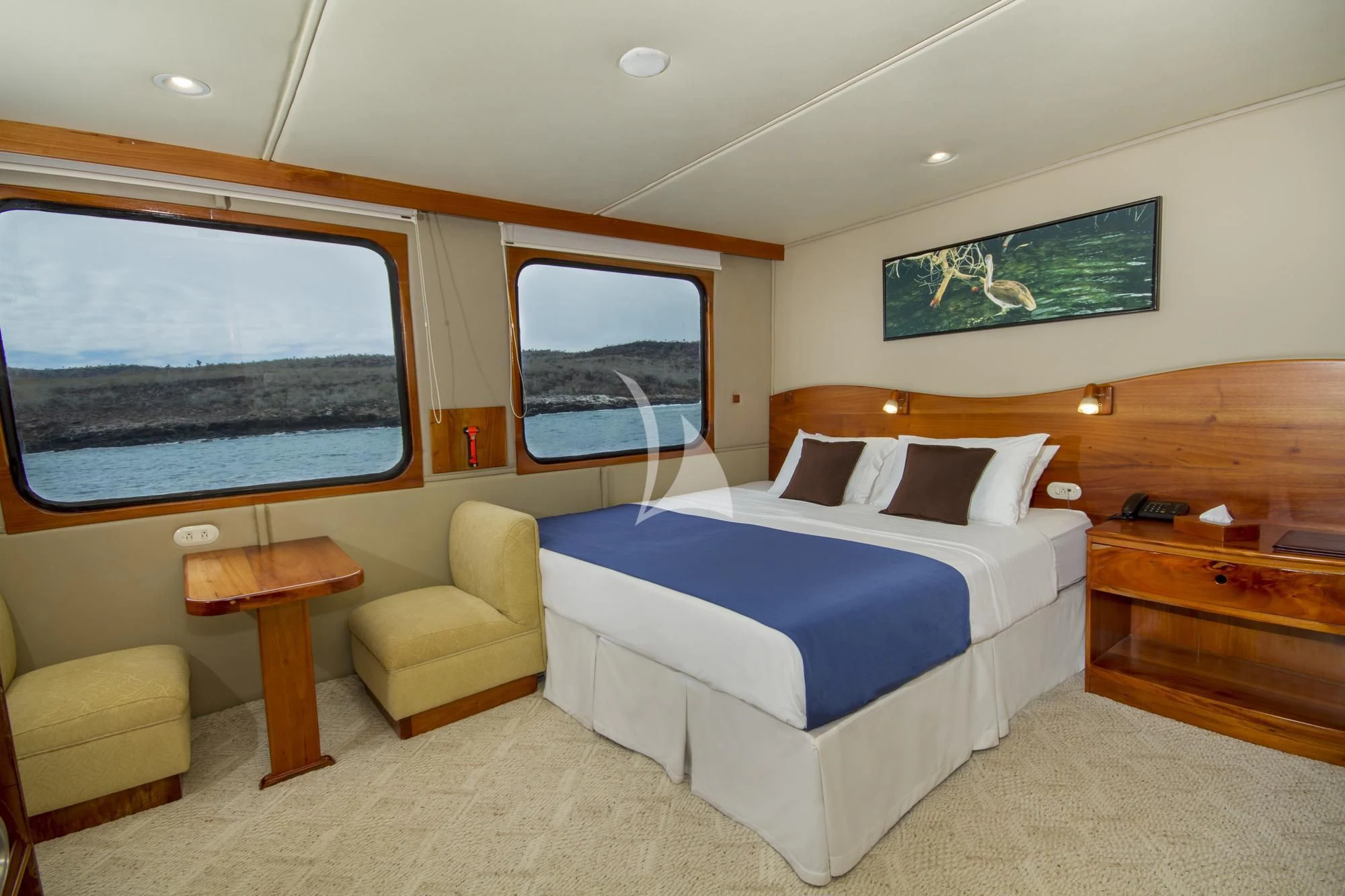 a bedroom with a bed and a tv aboard INTEGRITY Yacht for Sale