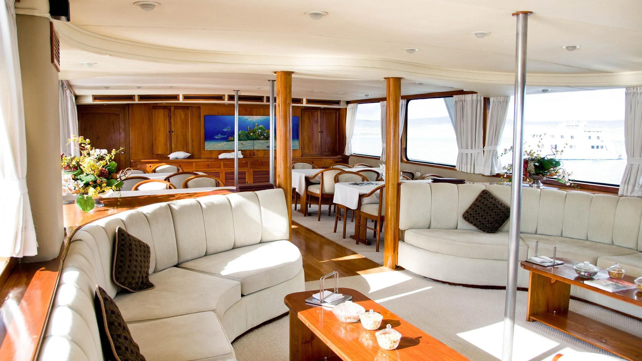 a living room with a large window aboard INTEGRITY Yacht for Sale