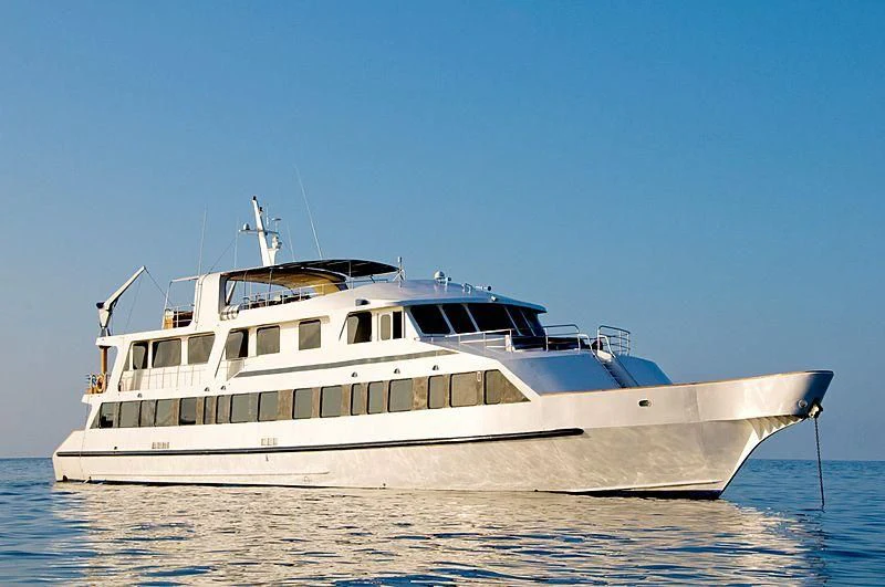 a white boat on the water aboard INTEGRITY Yacht for Sale