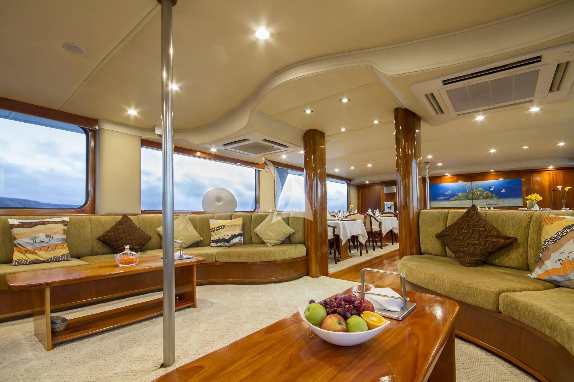 a living room with a couch and a table aboard INTEGRITY Yacht for Sale
