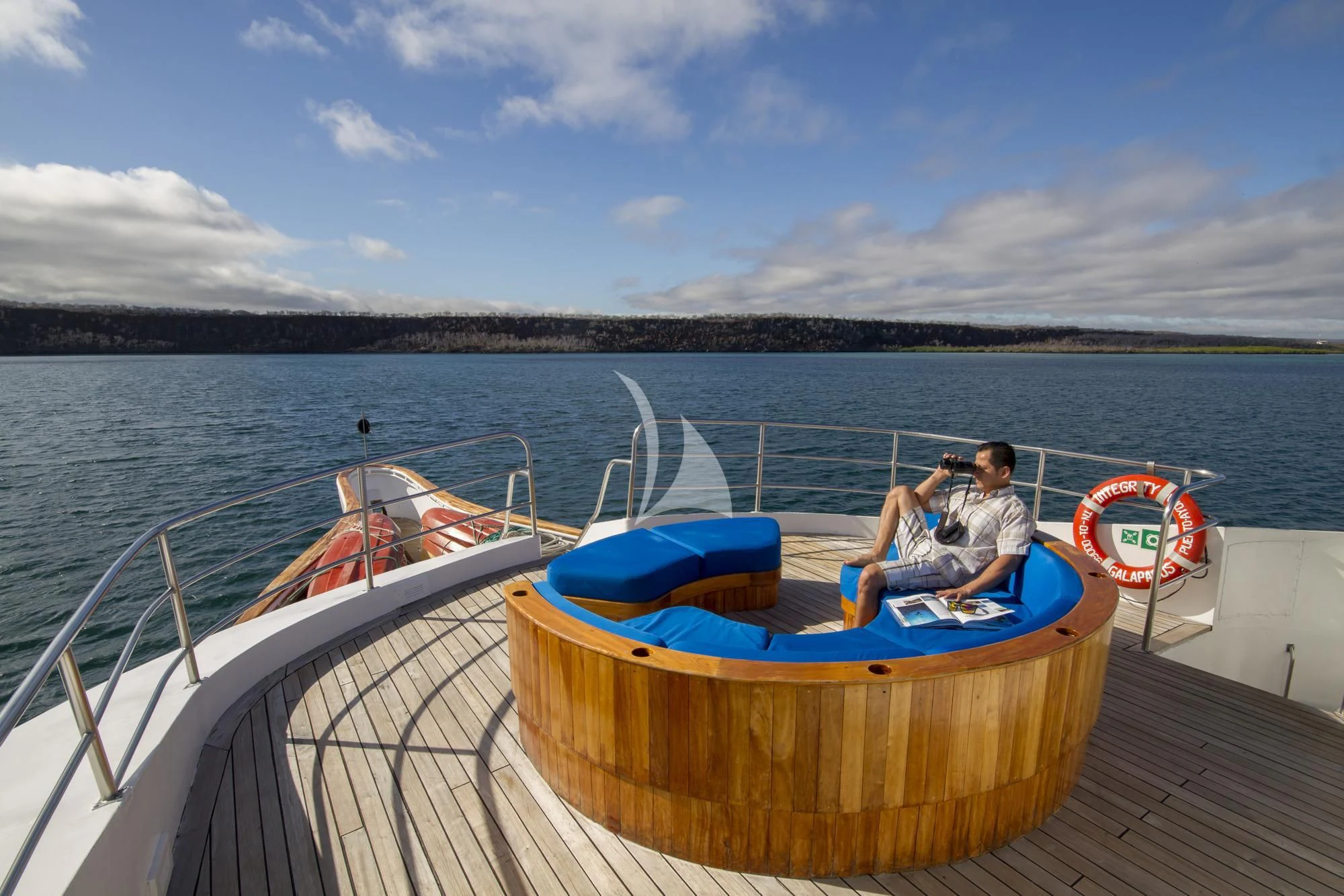 a man and a woman sitting on a boat in the water aboard INTEGRITY Yacht for Sale