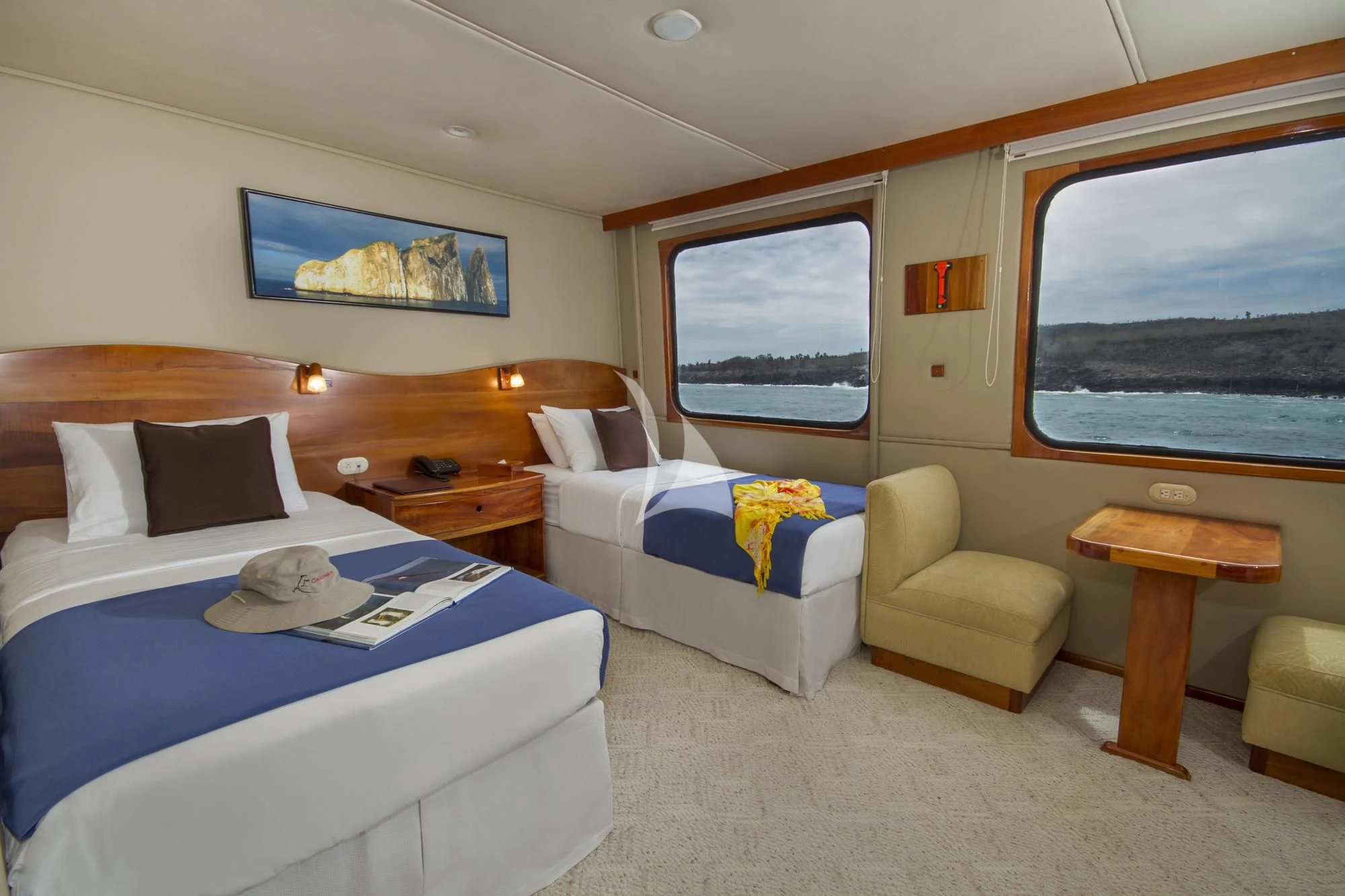 a bedroom with two beds aboard INTEGRITY Yacht for Sale