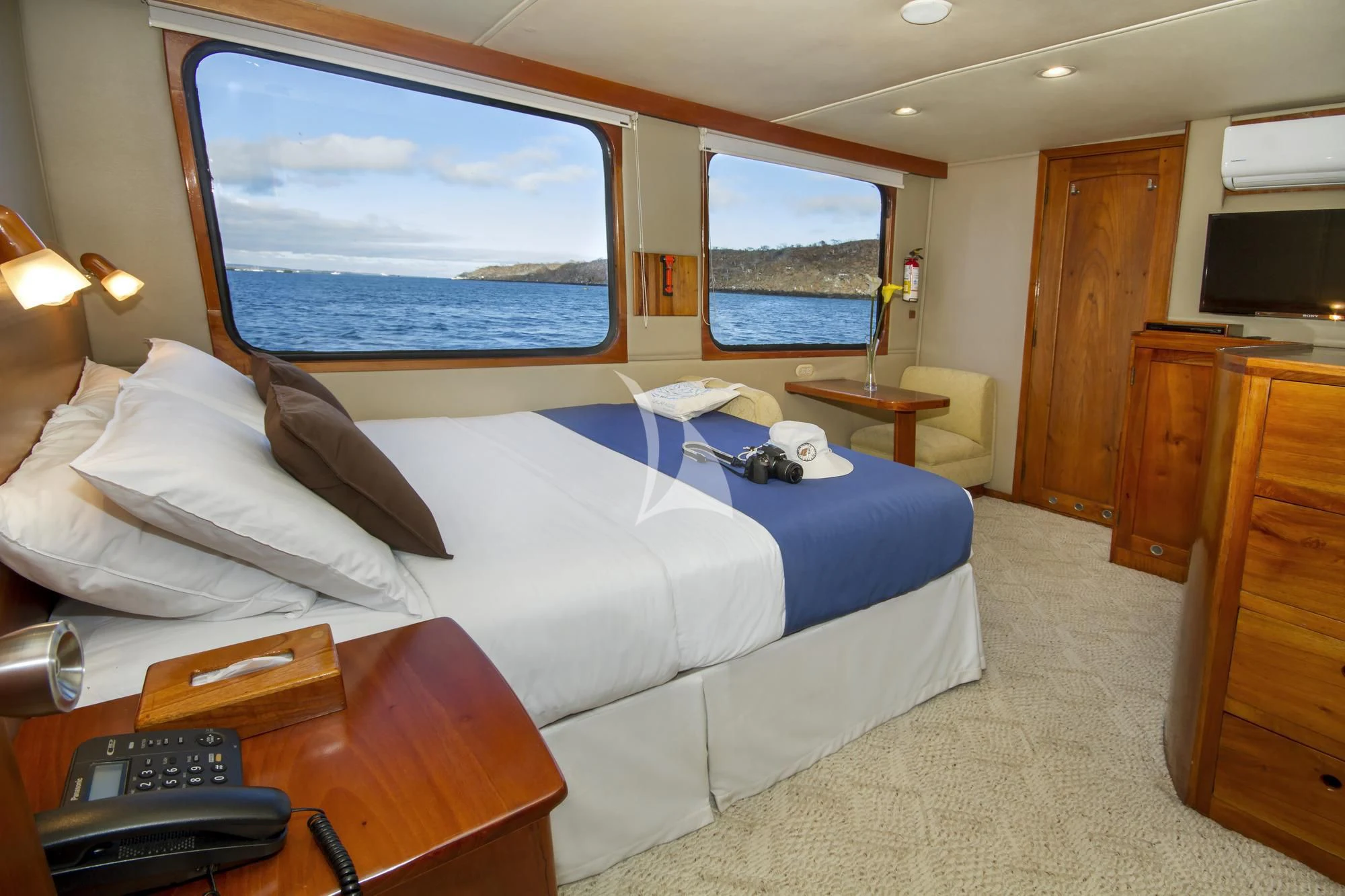 a bed in a room aboard INTEGRITY Yacht for Sale