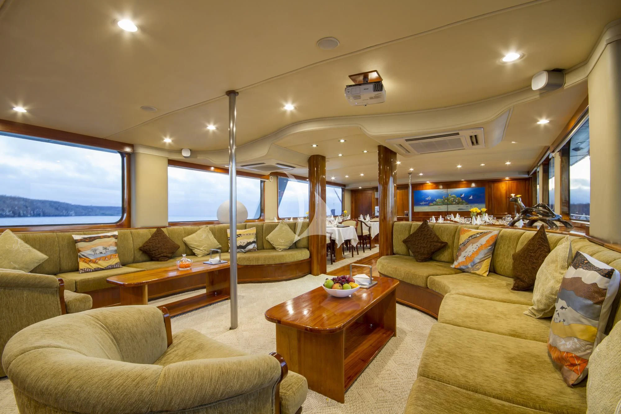 a living room with a couch and a table aboard INTEGRITY Yacht for Sale