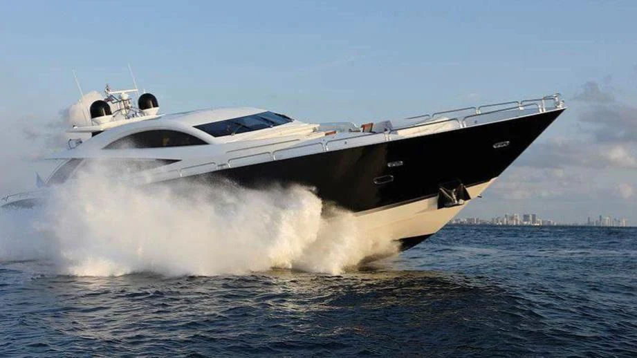 a boat with a large white ship on the water aboard SKY FALL Yacht for Sale