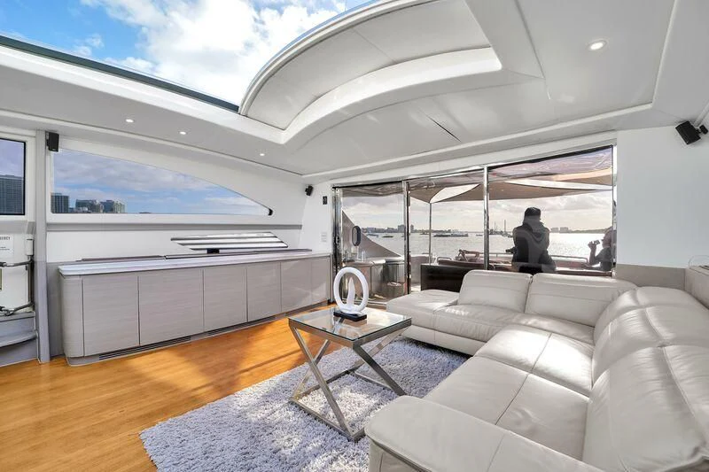 a living room with a large window aboard GHOST Yacht for Sale