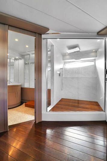 a room with a large glass door aboard GHOST Yacht for Sale