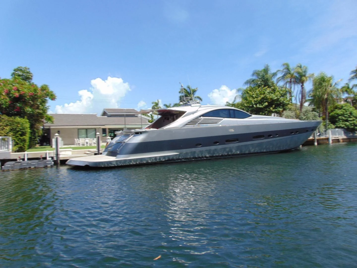 a boat docked at a pier aboard GHOST Yacht for Sale