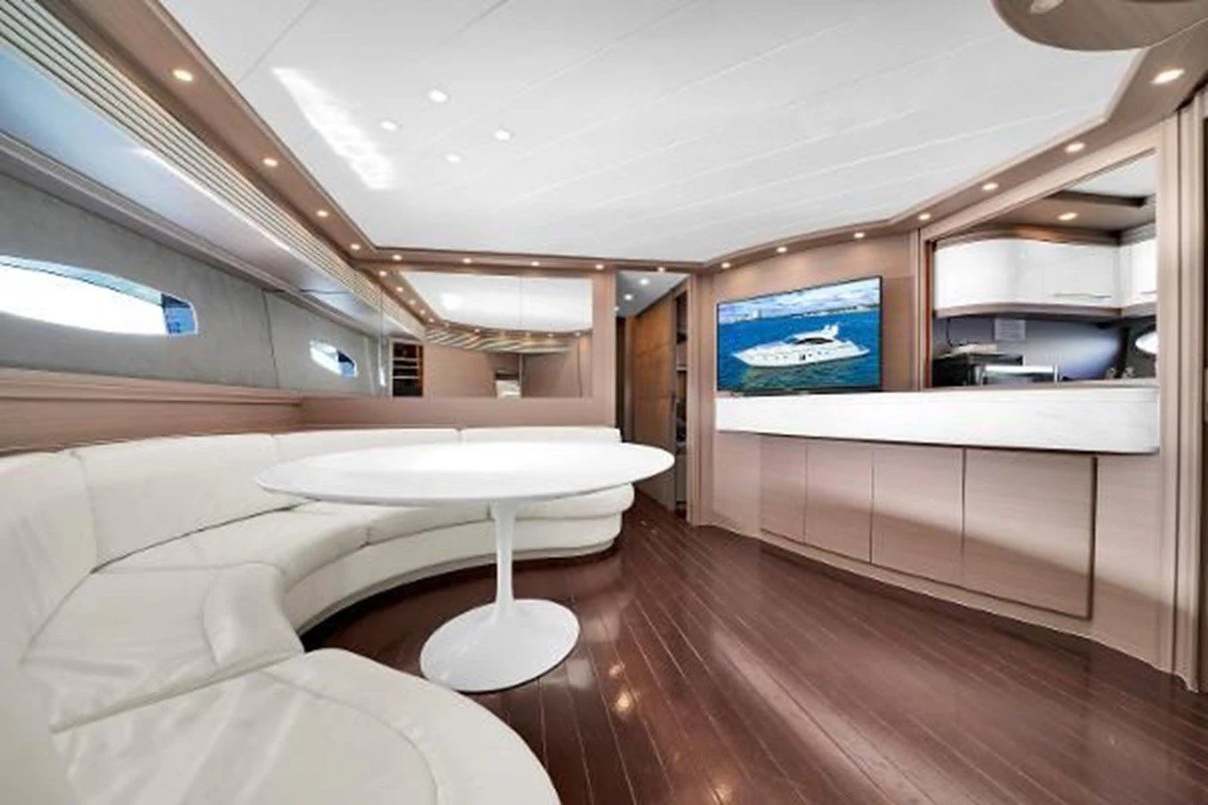 a room with a table and chairs aboard GHOST Yacht for Sale
